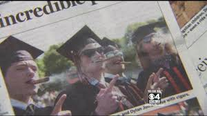 Cigar Smoking at Graduation