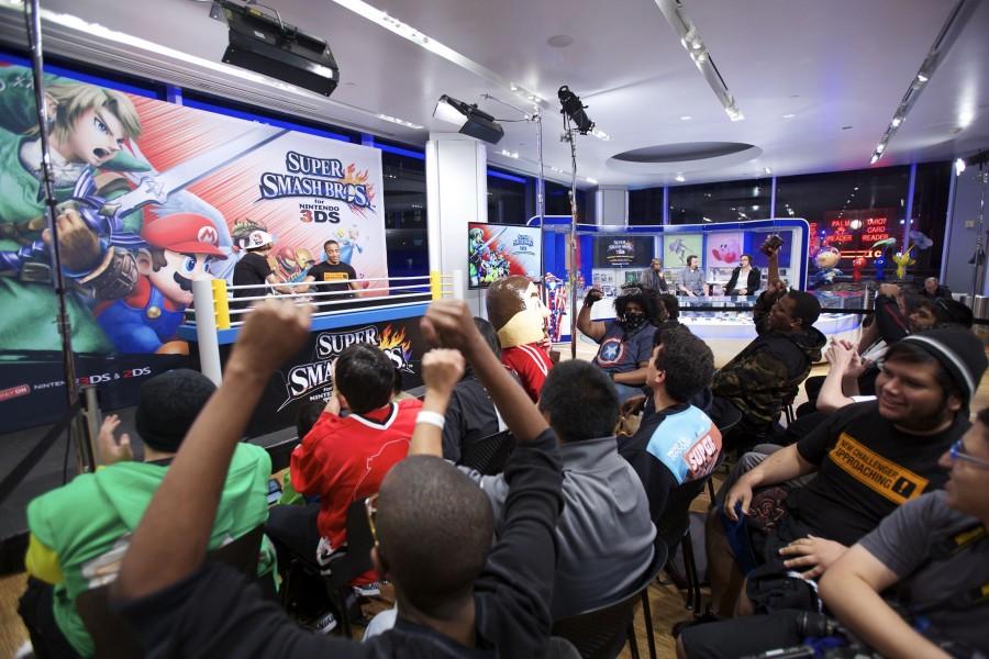 In this photo provided by Nintendo of America, Jesse McColm (L) of Balch Springs, TX, and Maurice Hall of Aurora, IL, face off in a battle in Super Smash Bros. for Nintendo 3DS at Nintendo World on Oct. 11, 2014. Not only did 16 of the top players in the nation compete to claim victory in the Super Smash Bros. for Nintendo 3DS National Open Tournament, but local fans also had the opportunity to sample the all-star fighting game as their favorite characters. The event was viewed by local fans and countless online spectators.